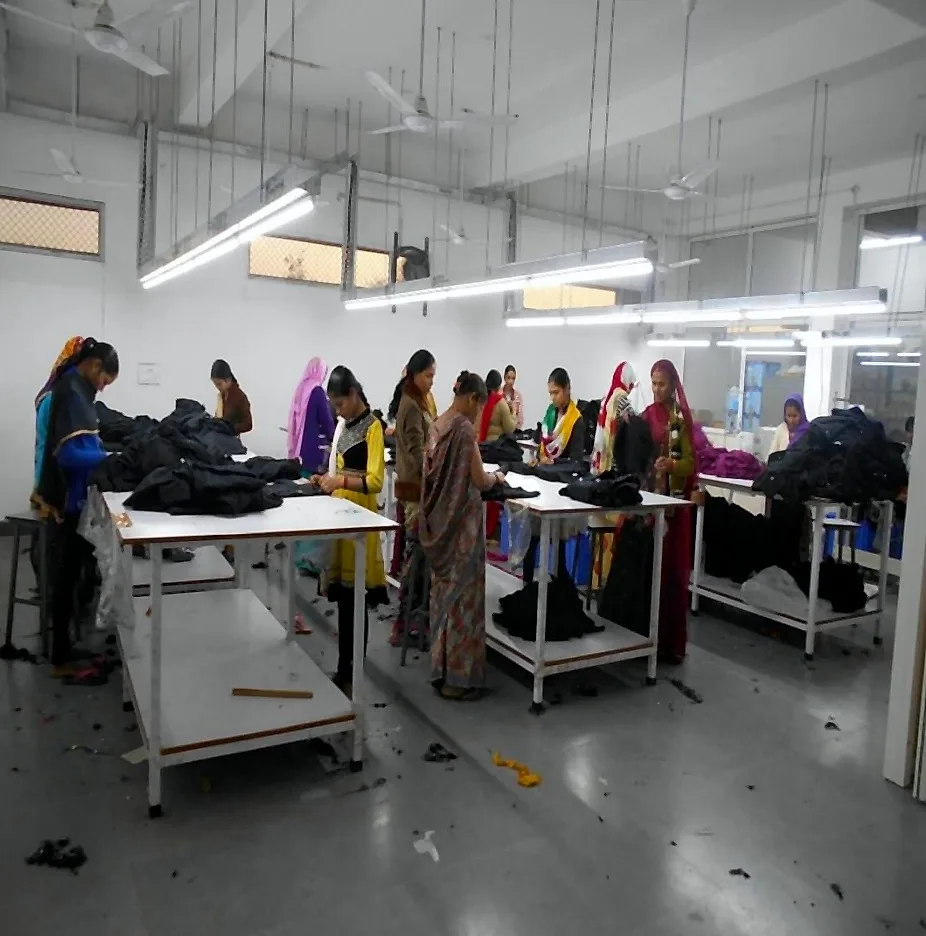 Checking area where finished garments are inspected and thread-cut