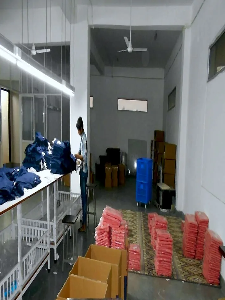 Polybagged garments stacked for cartoning and dispatch